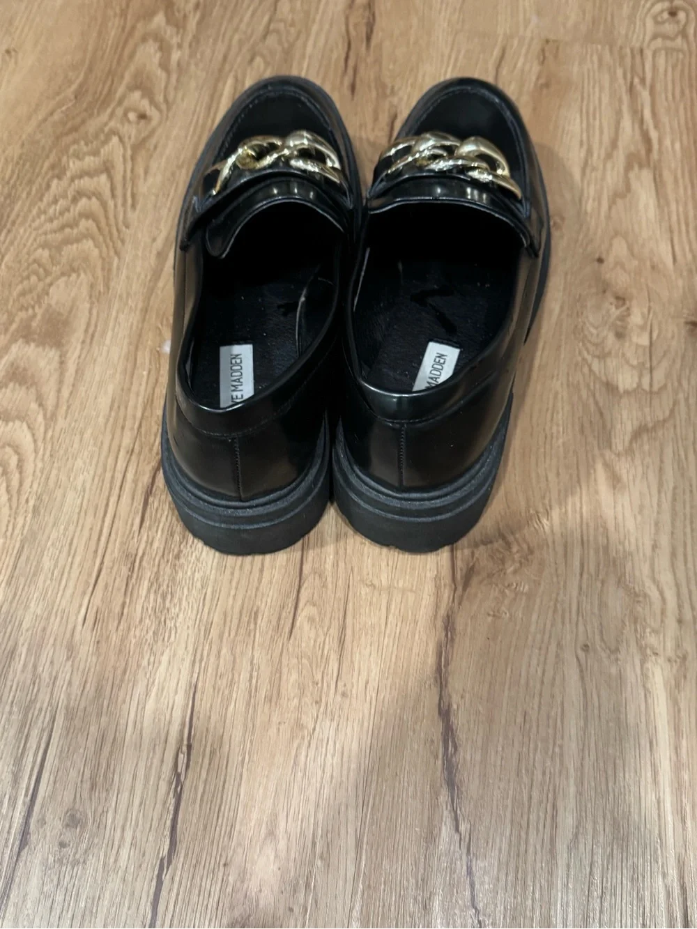 Steve Madden Black Leather Loafers with Gold Chain Accent